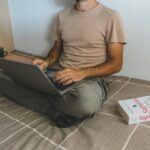 noah risling working on laptop